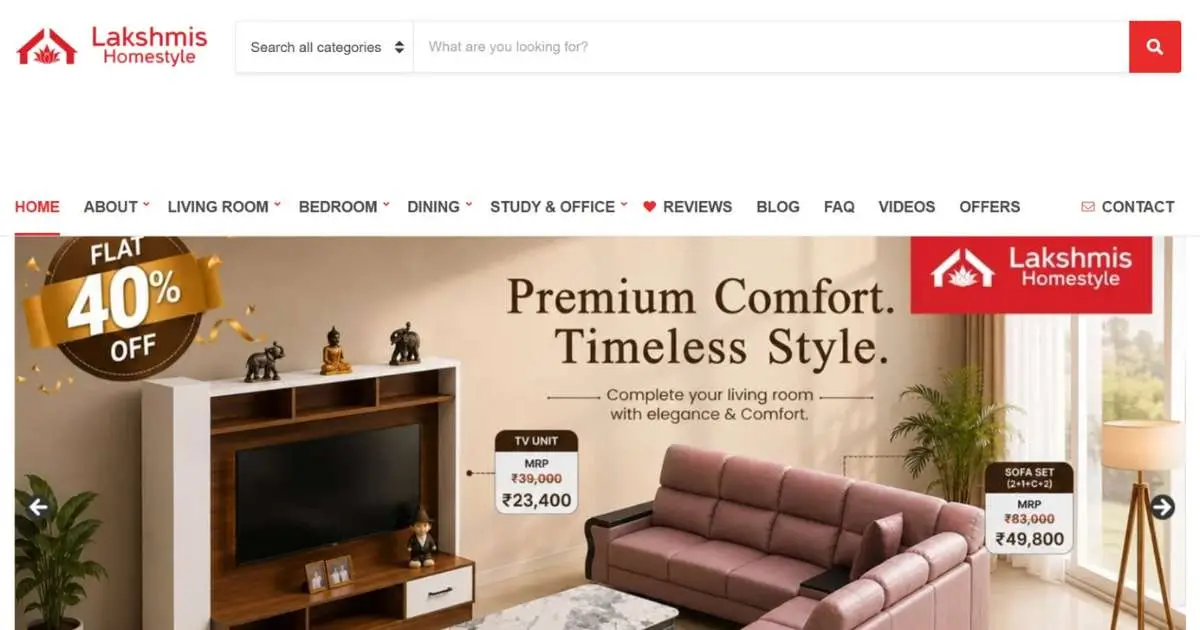 Lakshmis Home Style furniture website homepage showing sofa, dining and bedroom category browsing